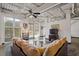 Open living area with exposed ductwork and large area rug at 5200 Peachtree Rd # 3116, Chamblee, GA 30341