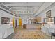 Open living area with exposed ductwork and large area rug at 5200 Peachtree Rd # 3116, Chamblee, GA 30341