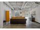 Open living area with exposed ductwork and large area rug at 5200 Peachtree Rd # 3116, Chamblee, GA 30341