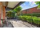 Private patio with lush landscaping and seating area at 5200 Peachtree Rd # 3116, Chamblee, GA 30341