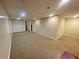 View of a basement area with carpeted floors at 305 Rampart St, Mcdonough, GA 30253