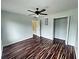 Bedroom featuring a ceiling fan and a closet at 305 Rampart St, Mcdonough, GA 30253