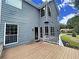 Deck with access from the house, offering backyard and neighborhood views at 305 Rampart St, Mcdonough, GA 30253