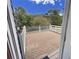 Wooden deck with white railings, offering a peaceful backyard view at 305 Rampart St, Mcdonough, GA 30253
