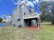 Two-story home with a deck and a spacious backyard and chain link fence at 305 Rampart St, Mcdonough, GA 30253