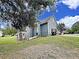 Beautiful two-story home with blue siding, an attached garage, and a well-maintained lawn at 305 Rampart St, Mcdonough, GA 30253