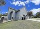 Exterior view of home showing siding, garage, stairs, and backyard at 305 Rampart St, Mcdonough, GA 30253