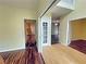 Hardwood floors throughout this open foyer, leading to other rooms at 305 Rampart St, Mcdonough, GA 30253