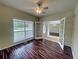 Home office with hardwood floors, ceiling fan, and french doors at 305 Rampart St, Mcdonough, GA 30253