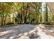 Spacious backyard with patio and wooded area at 3512 Casa Woods Ln, Clarkston, GA 30021