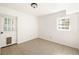 Spacious basement room with tile floors and a window at 3512 Casa Woods Ln, Clarkston, GA 30021