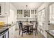 Bright kitchen with granite counters, stainless steel appliances, and eat-in area at 3512 Casa Woods Ln, Clarkston, GA 30021