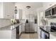 Updated kitchen with stainless steel appliances and granite countertops at 3512 Casa Woods Ln, Clarkston, GA 30021