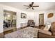 Open living space with hardwood floors, comfy furniture, and view into dining area at 3512 Casa Woods Ln, Clarkston, GA 30021