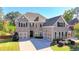 Two-story house with a large backyard and a swimming pool at 1190 Smithwell Pt, Kennesaw, GA 30152