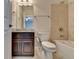Clean bathroom with single vanity and a shower/tub combo at 1190 Smithwell Pt, Kennesaw, GA 30152