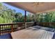 Spacious deck with ceiling fan, offering wooded views at 1190 Smithwell Pt, Kennesaw, GA 30152