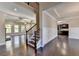 Open floor plan with hardwood floors and staircase at 1190 Smithwell Pt, Kennesaw, GA 30152