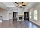 Gathering room with built-in shelving and a stone fireplace at 1190 Smithwell Pt, Kennesaw, GA 30152