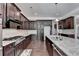 Kitchen boasts granite countertops and stainless steel appliances at 1190 Smithwell Pt, Kennesaw, GA 30152
