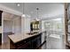 Open concept kitchen with large island and breakfast bar at 1190 Smithwell Pt, Kennesaw, GA 30152