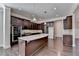 Gourmet kitchen with granite island and stainless steel appliances at 1190 Smithwell Pt, Kennesaw, GA 30152