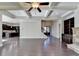 Spacious living room with hardwood floors, coffered ceiling, and fireplace at 1190 Smithwell Pt, Kennesaw, GA 30152