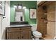 Basement bathroom with green walls and a walk-in shower at 5371 Tall Oak Dr, Marietta, GA 30068