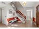 Bright entryway with staircase, bench, and terracotta accents at 5371 Tall Oak Dr, Marietta, GA 30068