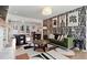 Mid-century modern living room with green velvet sofa and abstract art at 5371 Tall Oak Dr, Marietta, GA 30068