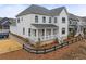 Beautiful two-story home with a manicured lawn and inviting front porch at 6320 Halcyon Garden Dr, Alpharetta, GA 30005