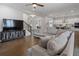 Open-concept living room seamlessly connects to the kitchen, perfect for entertaining at 6320 Halcyon Garden Dr, Alpharetta, GA 30005