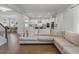 Open-concept living room seamlessly connects to the kitchen and dining, perfect for gatherings at 6320 Halcyon Garden Dr, Alpharetta, GA 30005