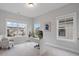 Bright office space with large windows and minimalist design, creating a productive atmosphere at 6320 Halcyon Garden Dr, Alpharetta, GA 30005