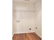 Functional laundry area with shelving and floor-to-ceiling storage at 1013 Bluecoat Cir, Hampton, GA 30228