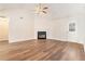 Spacious living room with hardwood floors and a fireplace at 1013 Bluecoat Cir, Hampton, GA 30228