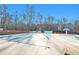 Community pool with safety cover and surrounding area at 1013 Bluecoat Cir, Hampton, GA 30228