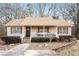 Charming ranch home with covered porch and landscaped yard at 110 Elk Ridge Dr, Social Circle, GA 30025