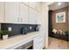 Well-appointed butler's pantry with ample storage at 305 Gordon Ne Ave, Atlanta, GA 30307