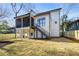 Two-story home with screened porch, deck, and backyard at 305 Gordon Ne Ave, Atlanta, GA 30307