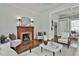 Bright living room with fireplace, seamlessly connected to other living spaces at 725 Oakland Se Ave, Atlanta, GA 30315