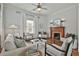 Inviting living room with elegant furnishings, fireplace and ample natural light at 725 Oakland Se Ave, Atlanta, GA 30315
