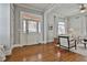 Sunlit living room showcasing hardwood floors and elegant architectural details at 725 Oakland Se Ave, Atlanta, GA 30315
