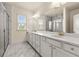 Bright bathroom with marble floors, double vanity, and glass enclosed shower at 1284 Park Bench Pl, Mableton, GA 30126