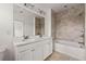 Beautiful bathroom featuring double sinks and a separate tub and shower at 1284 Park Bench Pl, Mableton, GA 30126