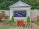 Elegant community entrance sign surrounded by beautiful plants and greenery adds charm to the neighborhood at 1284 Park Bench Pl, Mableton, GA 30126