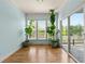 Bright breakfast nook with hardwood floors and sliding door leading to the deck at 1284 Park Bench Pl, Mableton, GA 30126