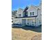 Beautiful two-story home with a gray exterior and black accents at 4863 Amsler Rd, Ellenwood, GA 30294