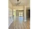 Open-concept living room with hardwood floors and an open floor plan, great for entertaining at 4863 Amsler Rd, Ellenwood, GA 30294