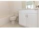 Clean bathroom with white subway tile and vanity at 1442 Casteel Lake Ln # 277, Buford, GA 30518